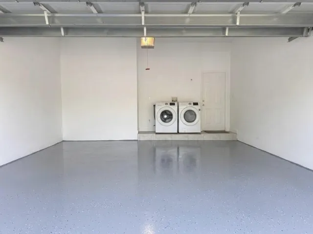 two car garage with washer & dryer. currently used for storage of furniture