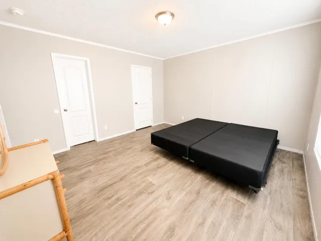 Minimalist Bedroom with Black Platform B