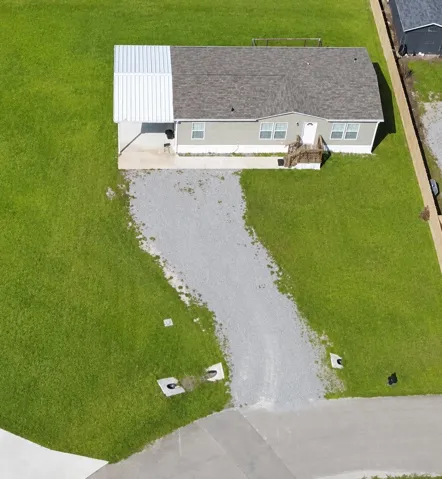 Aerial View of Green Suburban Home