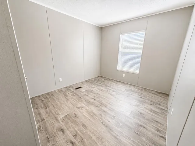 Sunlit Minimalist Neutral Bedroom