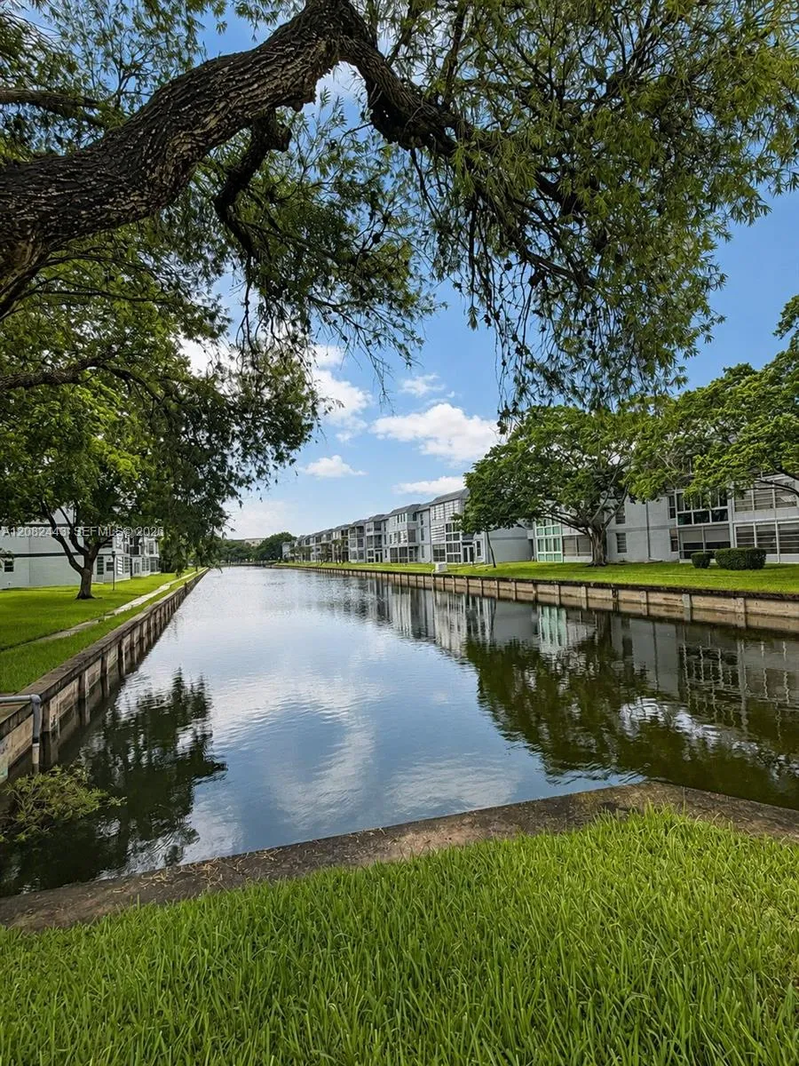 Canal and landscaped surroundings.