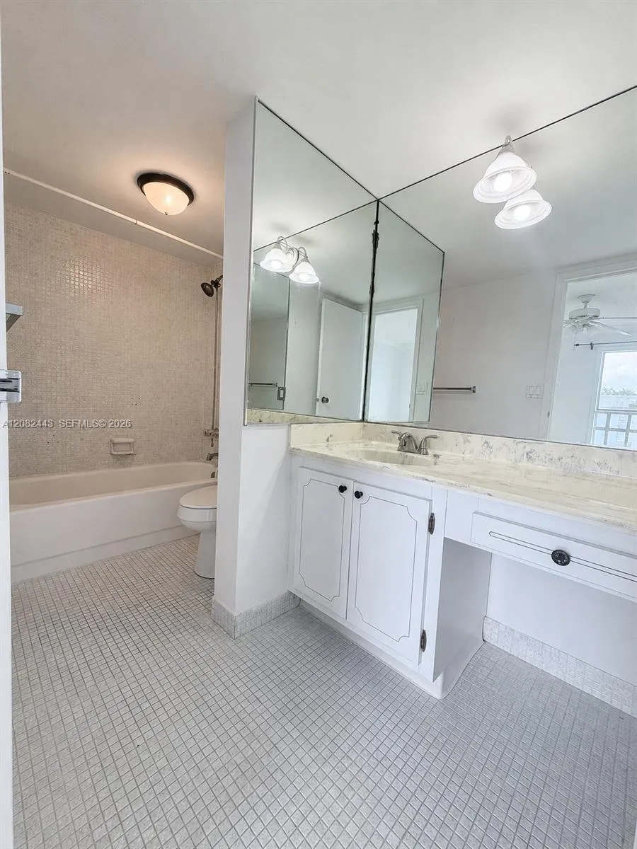 Primary bathroom with bathtub.