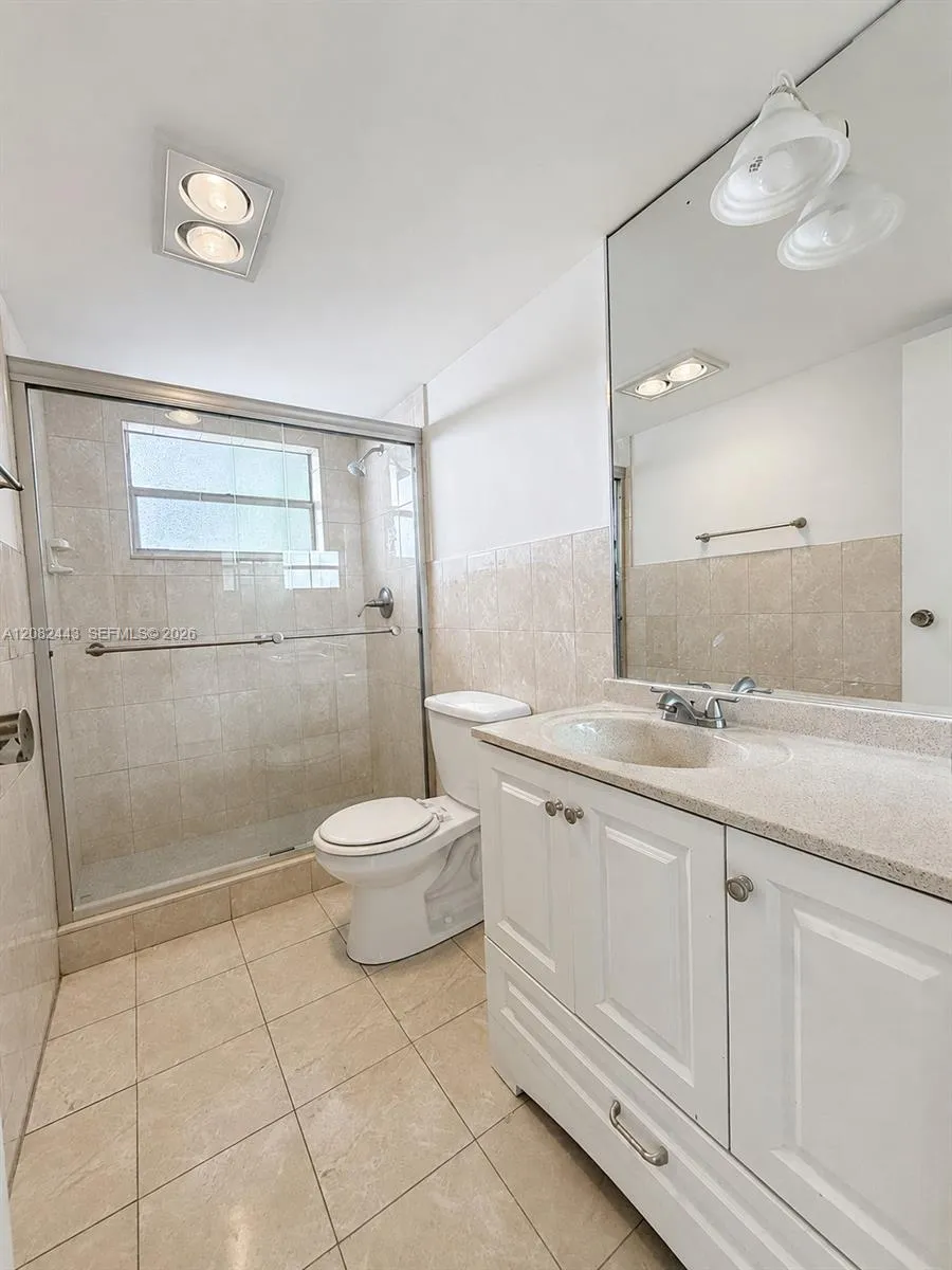Second bathroom with enclosed shower