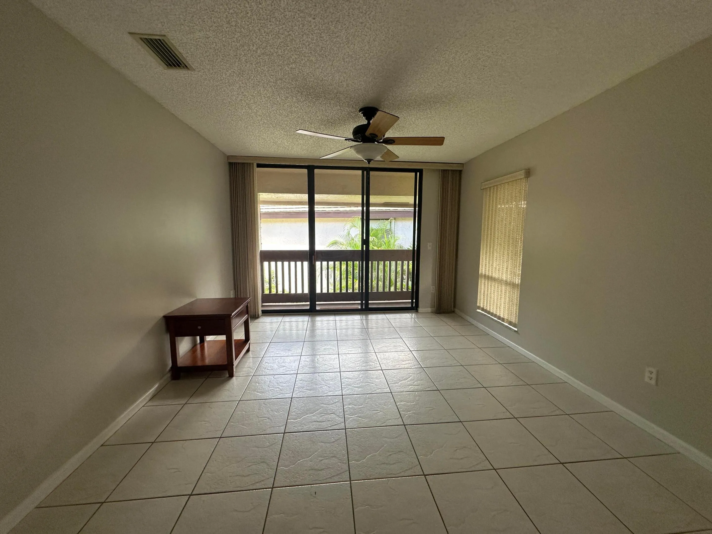 Large dining room next to the kitchen. Has a small balcony.