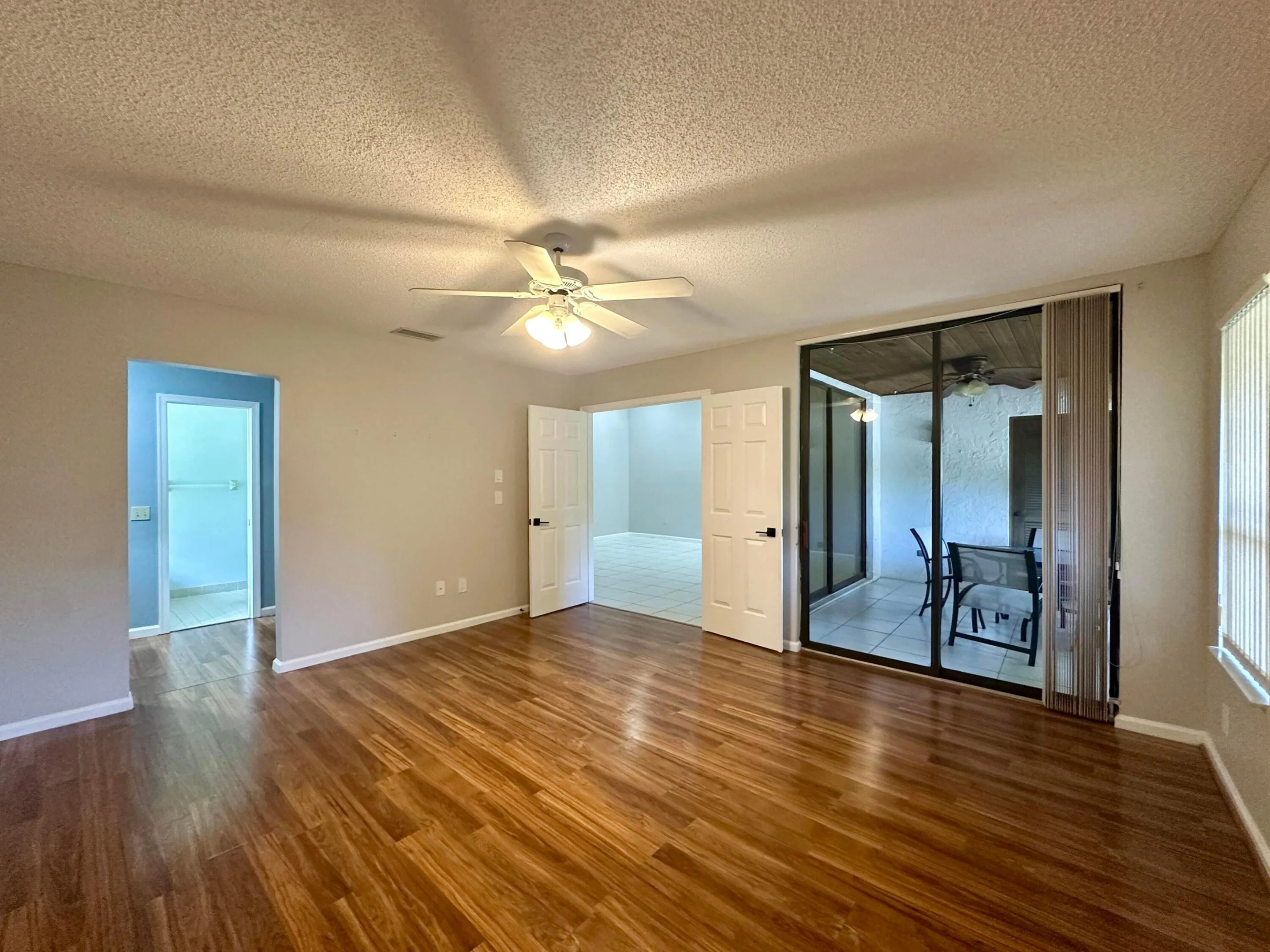 Primary Bedroom with sliding door towards balcony