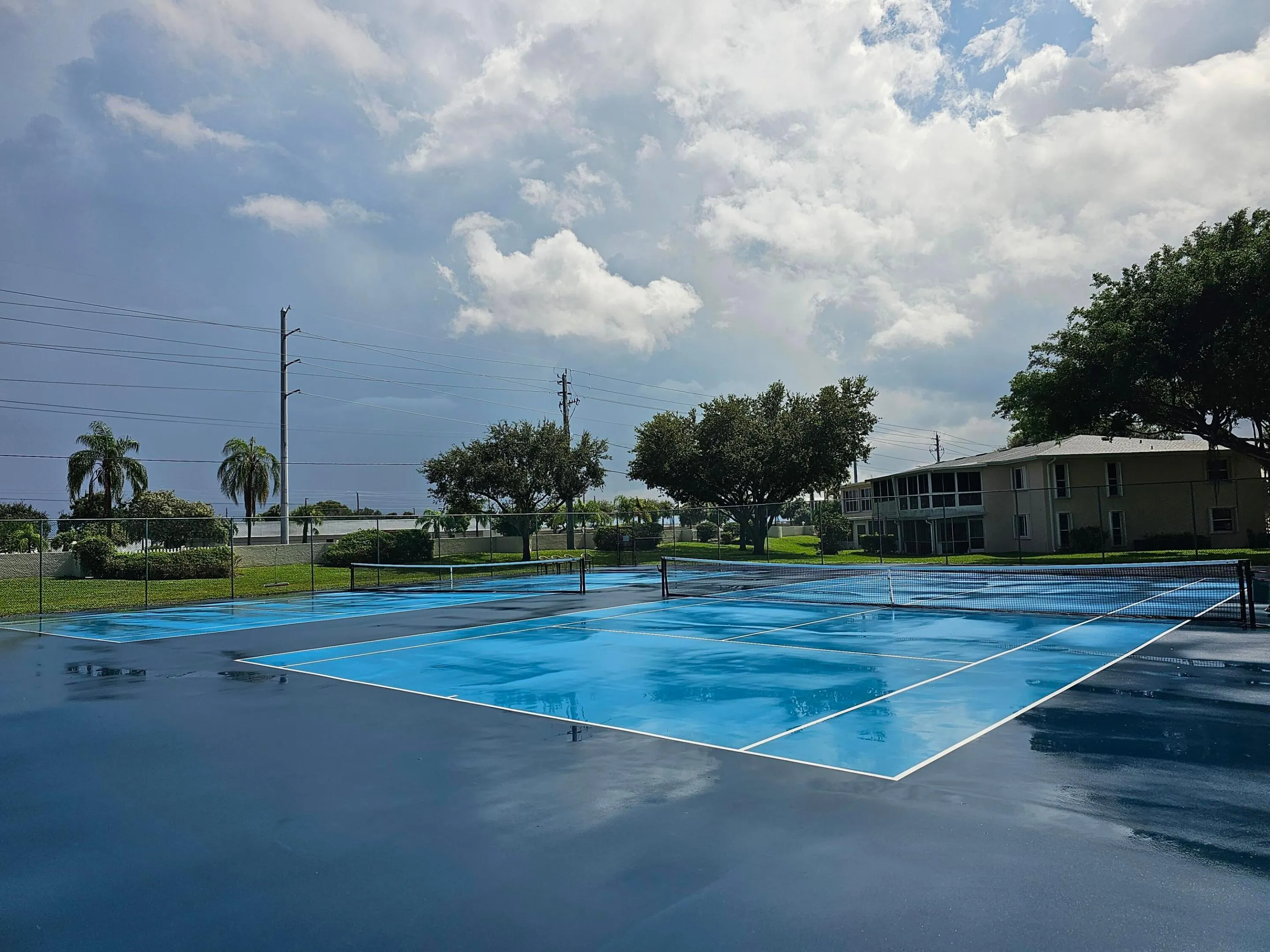 Newly Refinished Tennis Courts Located S