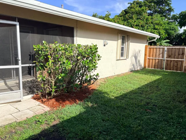 SPACIOUS FENCED BACK YARD