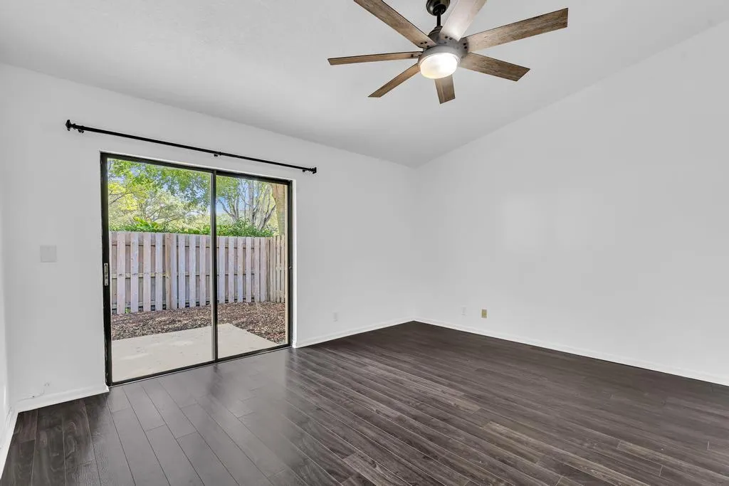 PRIMARY BEDROOM WITH VAULTED CEILINGS