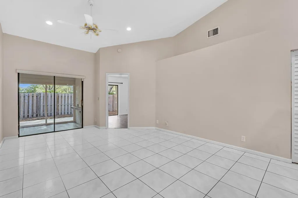 DINING & LIVING ROOM COMBO W/VAULTED CEILINGS