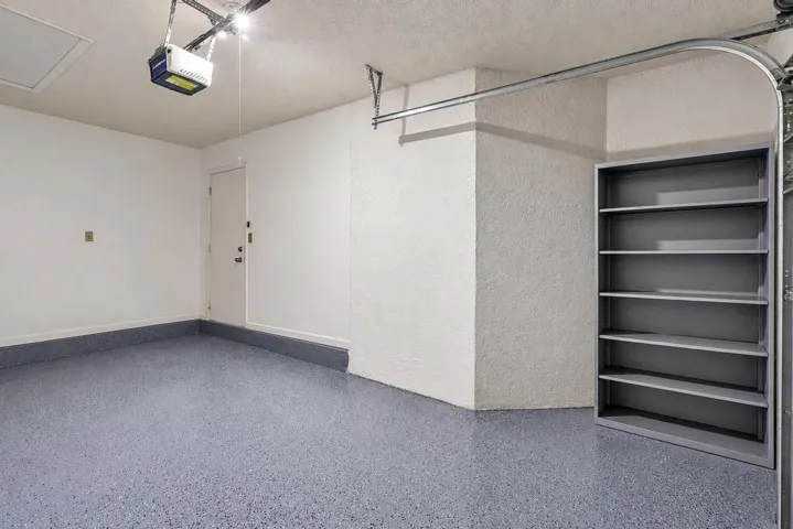 FRESHLY PAINTED GARAGE WITH EPOXY FLOOR