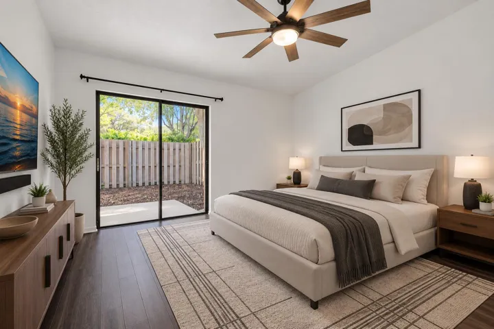 VIRTUALLY STAGED - PRIMARY BEDROOM WITH VAULTED CEILINGS