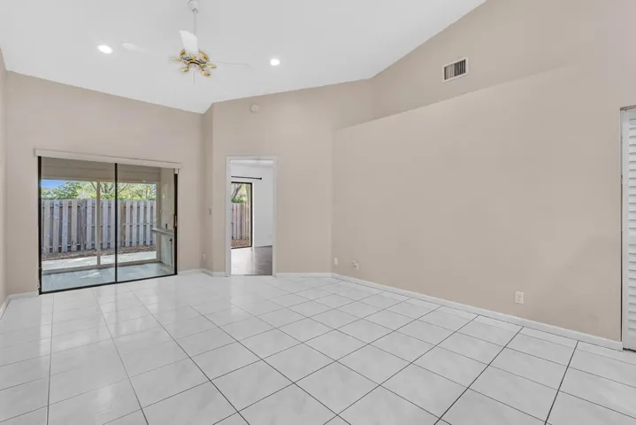 DINING & LIVING ROOM COMBO W/VAULTED CEILINGS