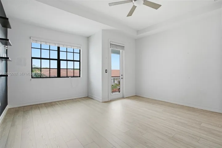Master Bedroom - Notice New Laminate Floors & Ceiling Fan