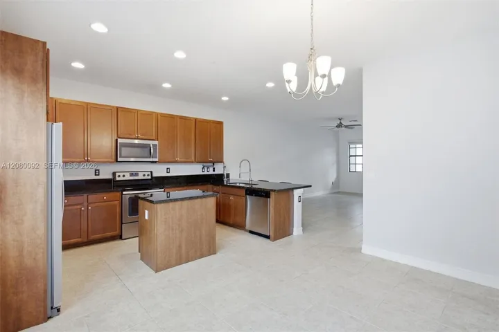 Modern Kitchen with Rich Wood Cabinetry