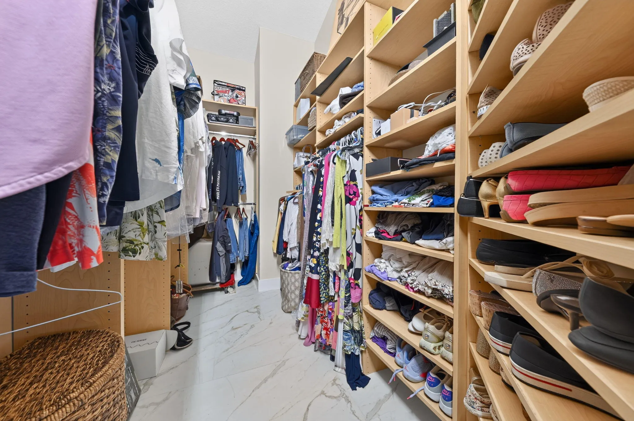Custom shelving in large walk in closet