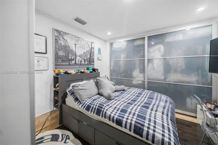 Comfortable Secondary Bedroom 3 featuring a spacious built-in closet and a clean, modern layout.
