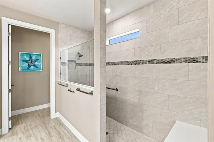 Primary bathroom with walk in shower & separate water closet