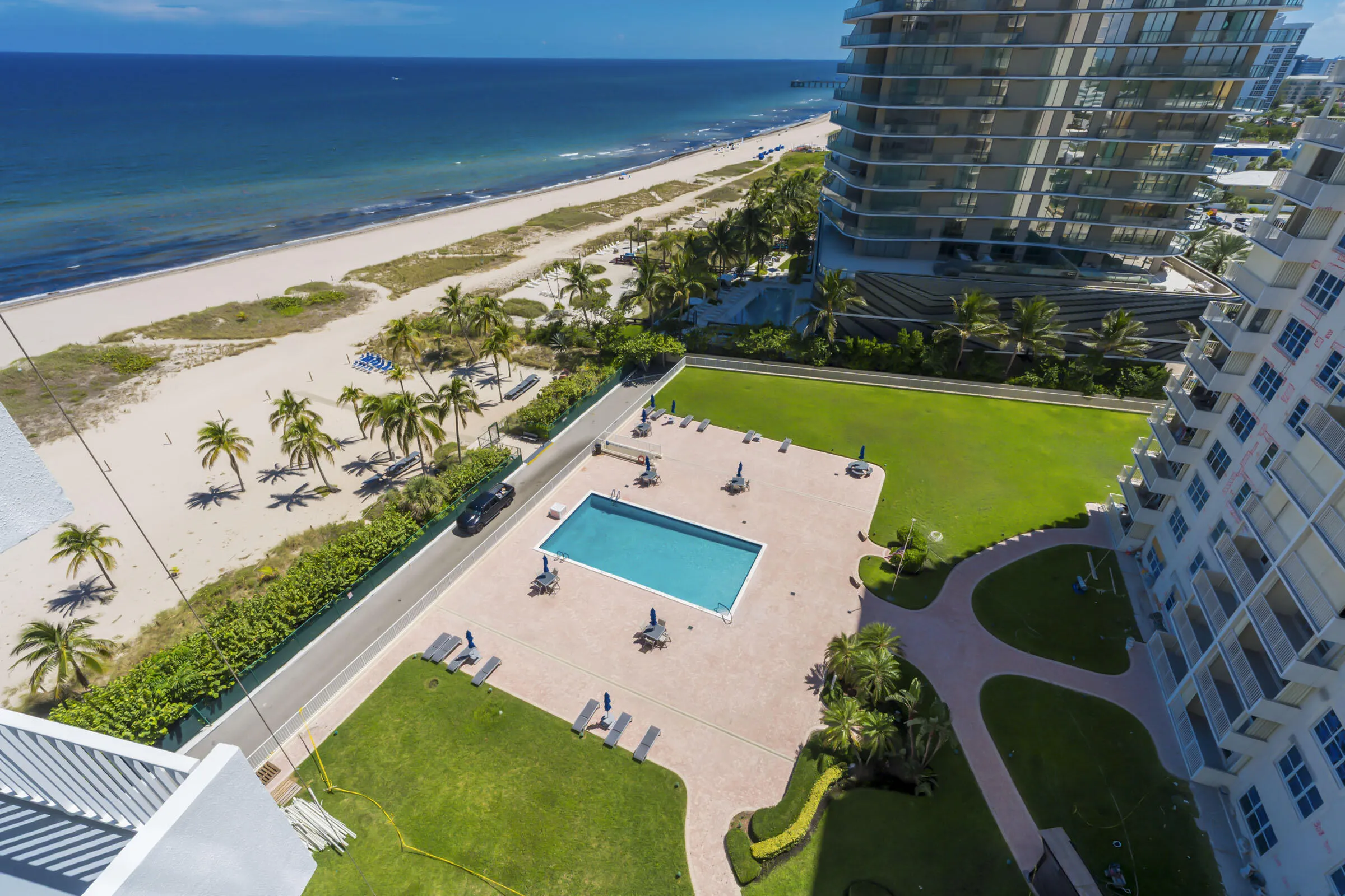 Relax by the pool or step onto the beach-right outside your door!
