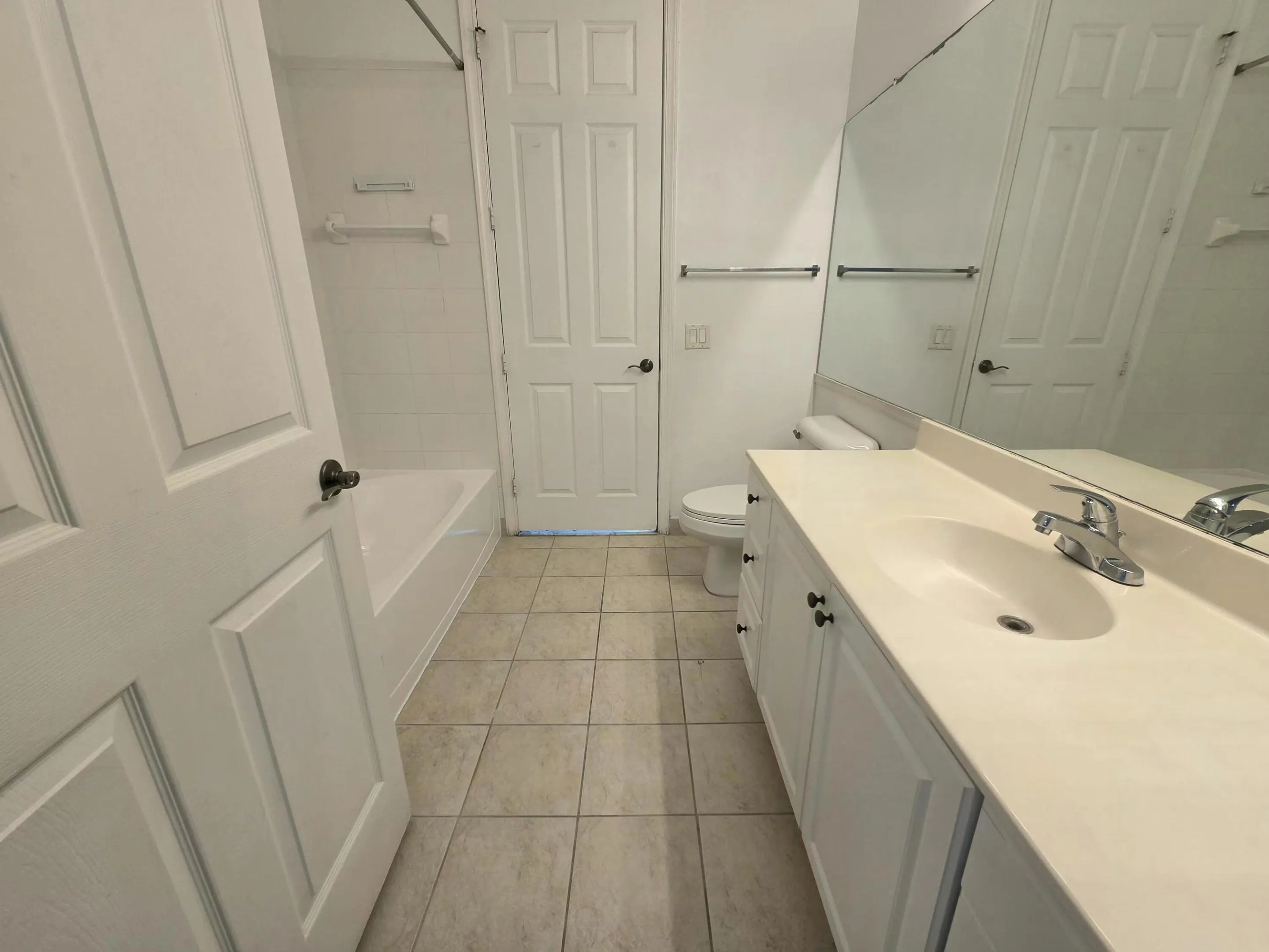 Secondary bathroom has access to 2nd bedroom and to unit entrance hall