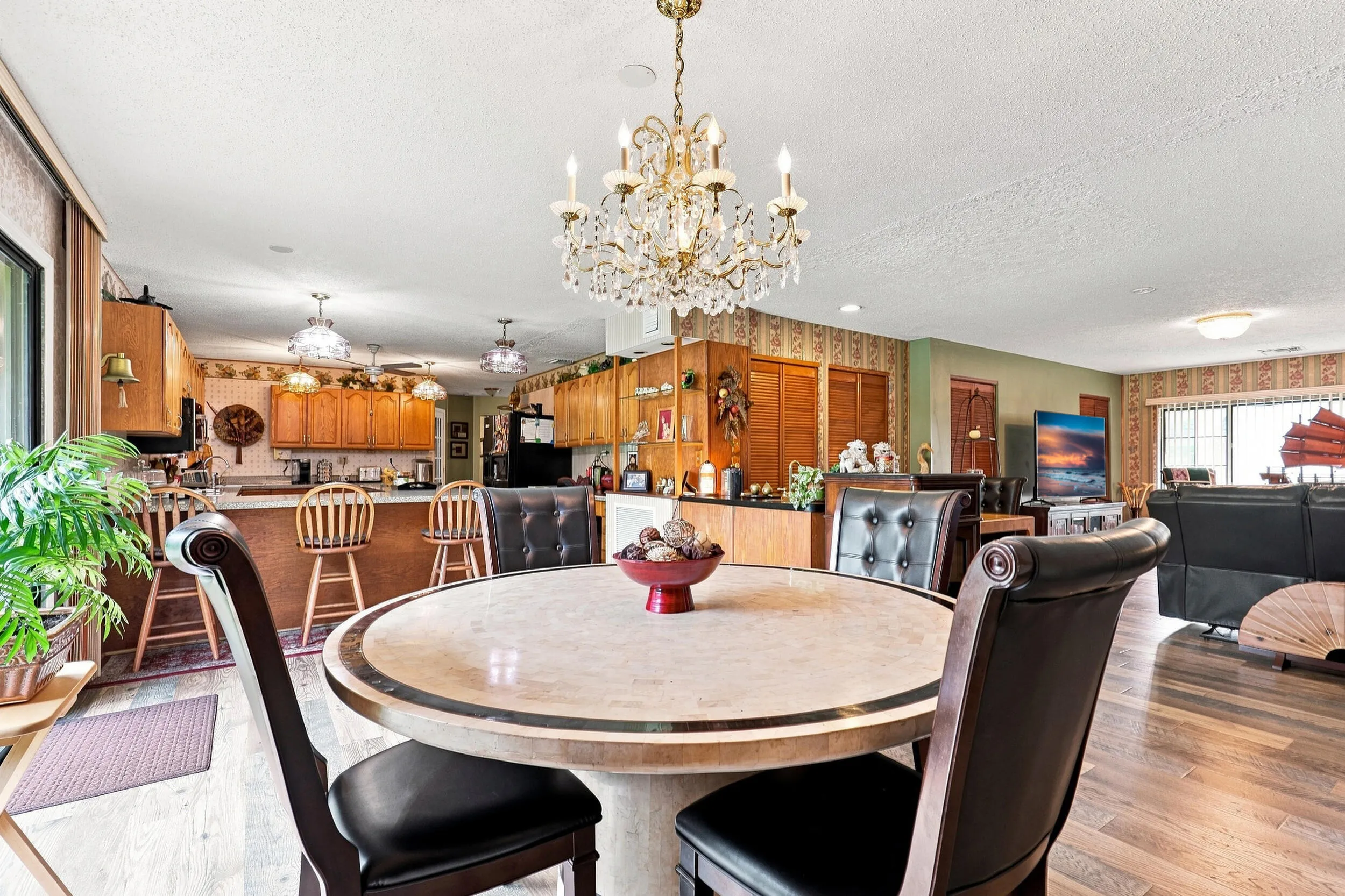 Open dining space overlooking the spacious kitchen, creating an easy flow for everyday living and entertaining.
