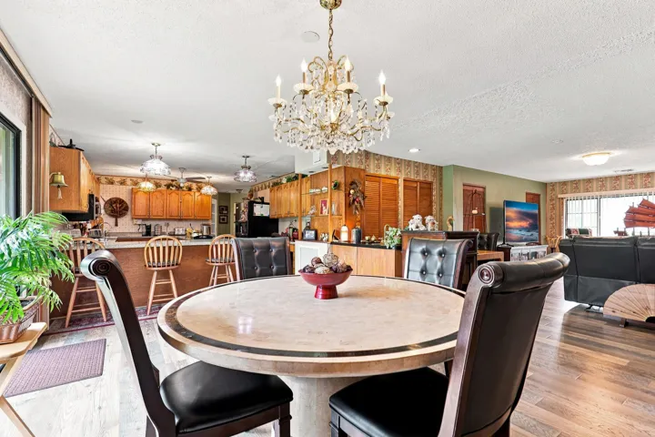 Open dining space overlooking the spacious kitchen, creating an easy flow for everyday living and entertaining.