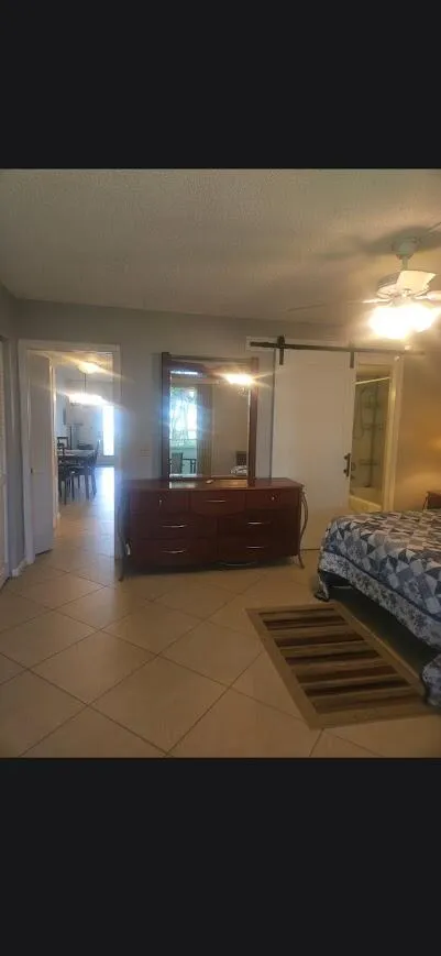 photo of bedroom from patio sliding door