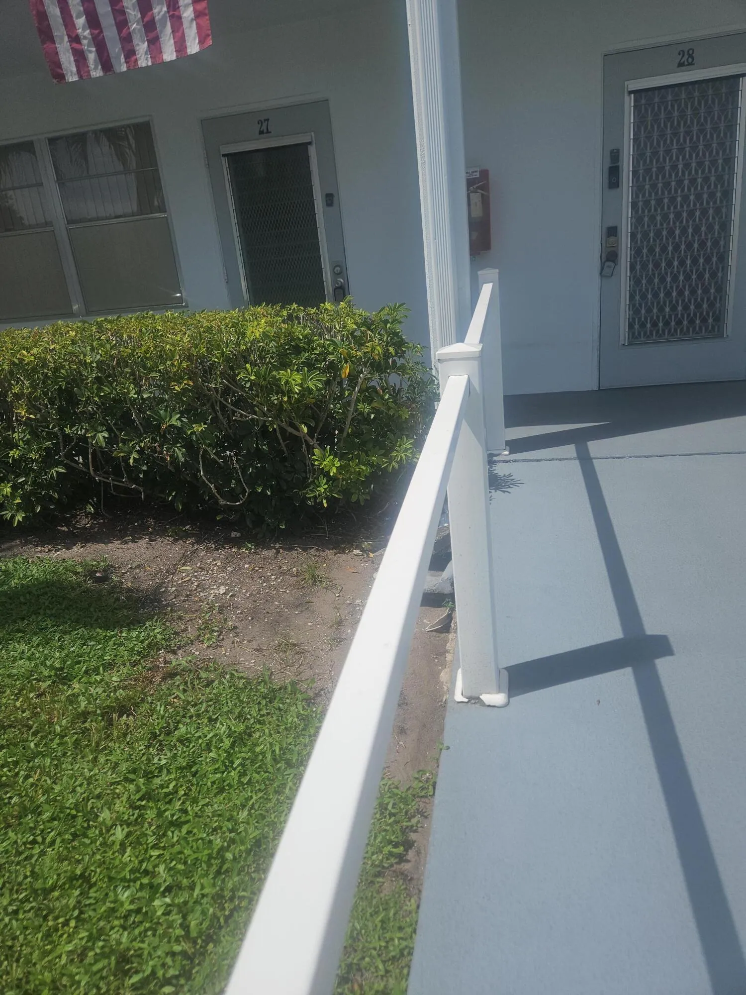 Exterior, walkway to Condo, parking is c