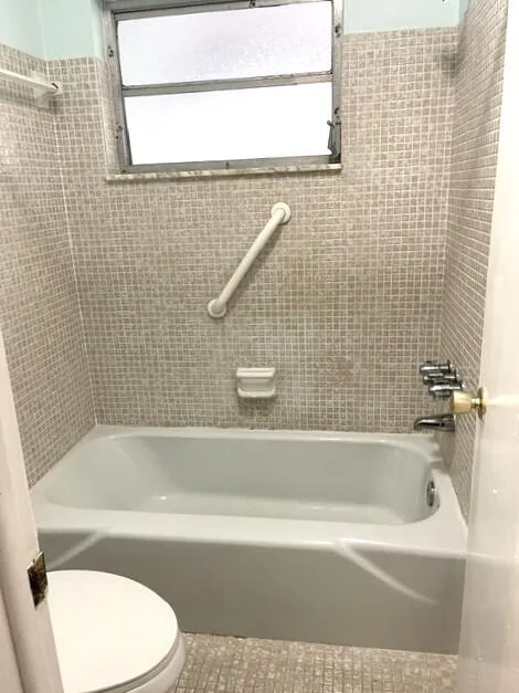 Master bathroom with tub shower combo