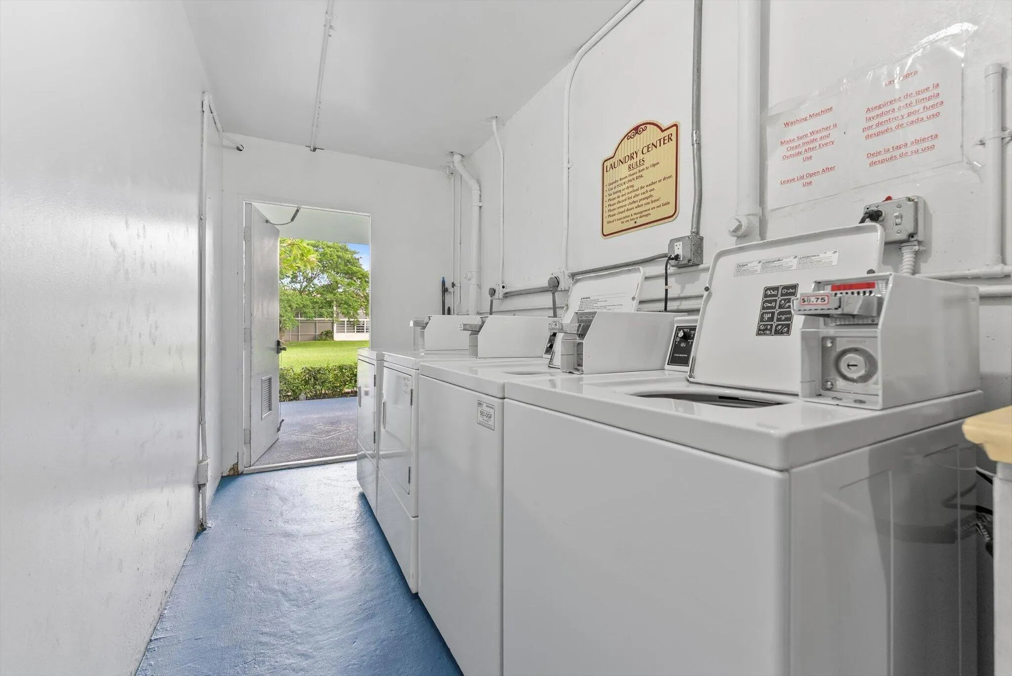 Laundry room next door to the unit.