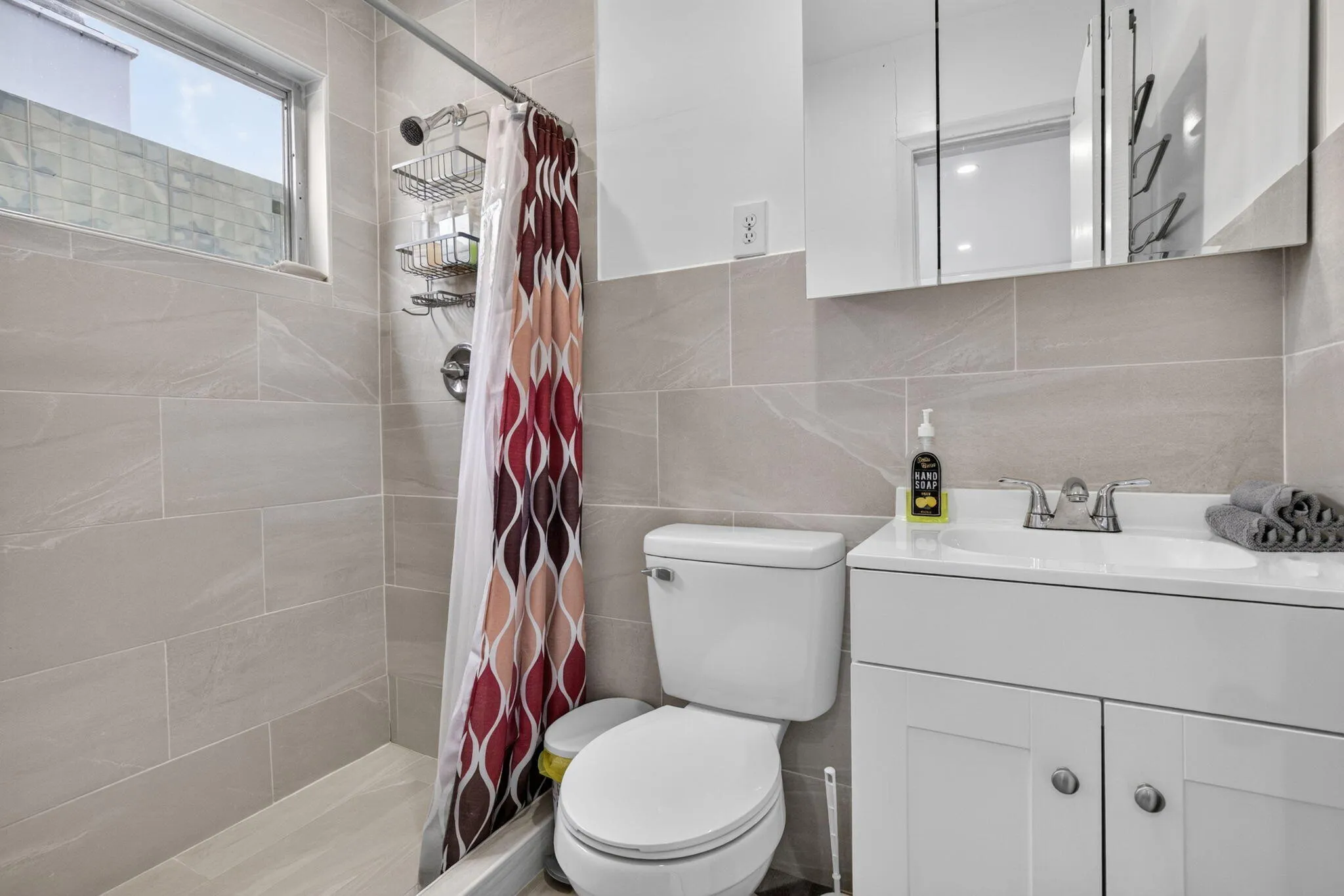 Renovated Guest Bathroom — Full Tub/Shower, Floor-to-Ceiling Tile and Modern Vanity