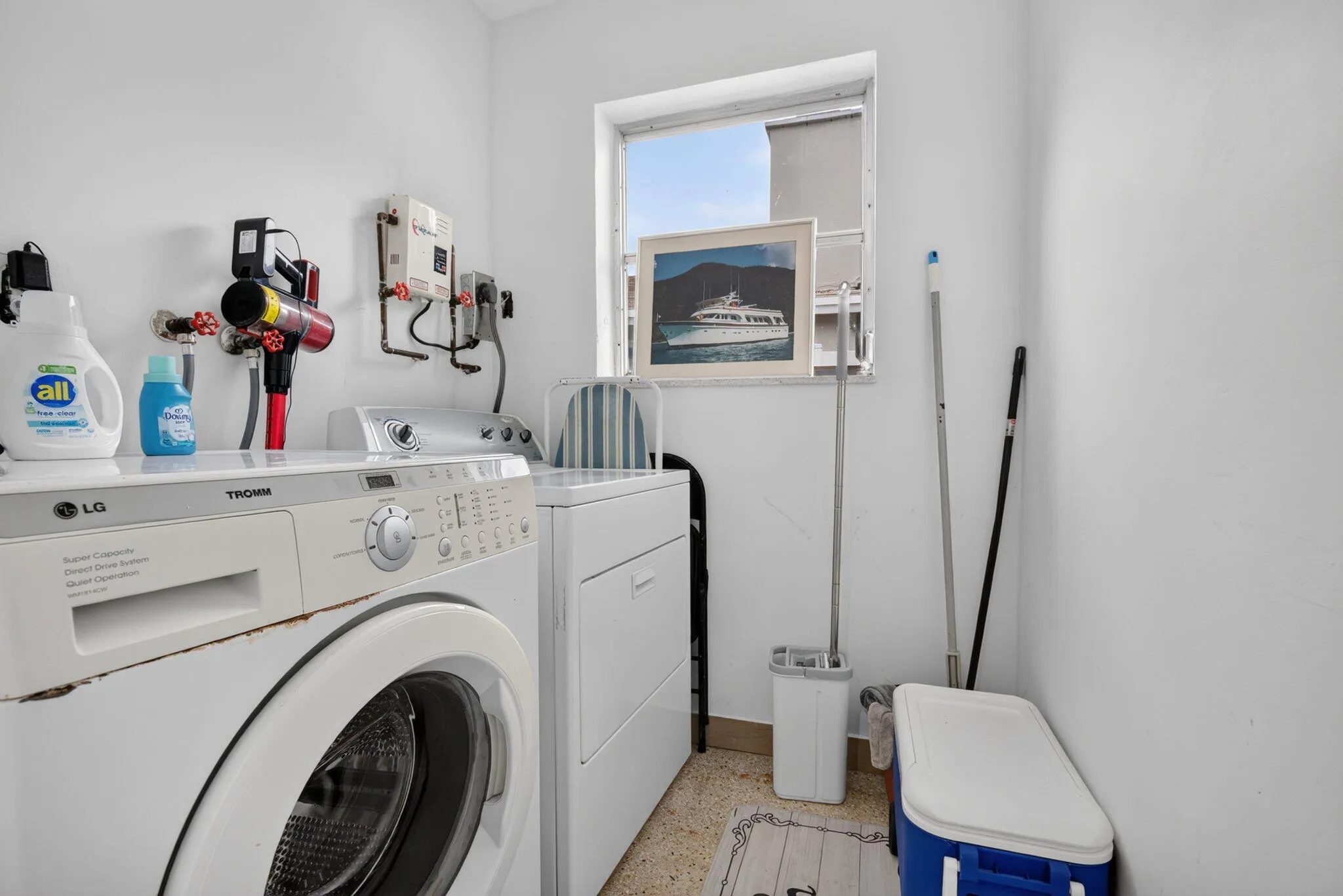 Interior Laundry Room — Full-Size Front-Load Washer and Dryer