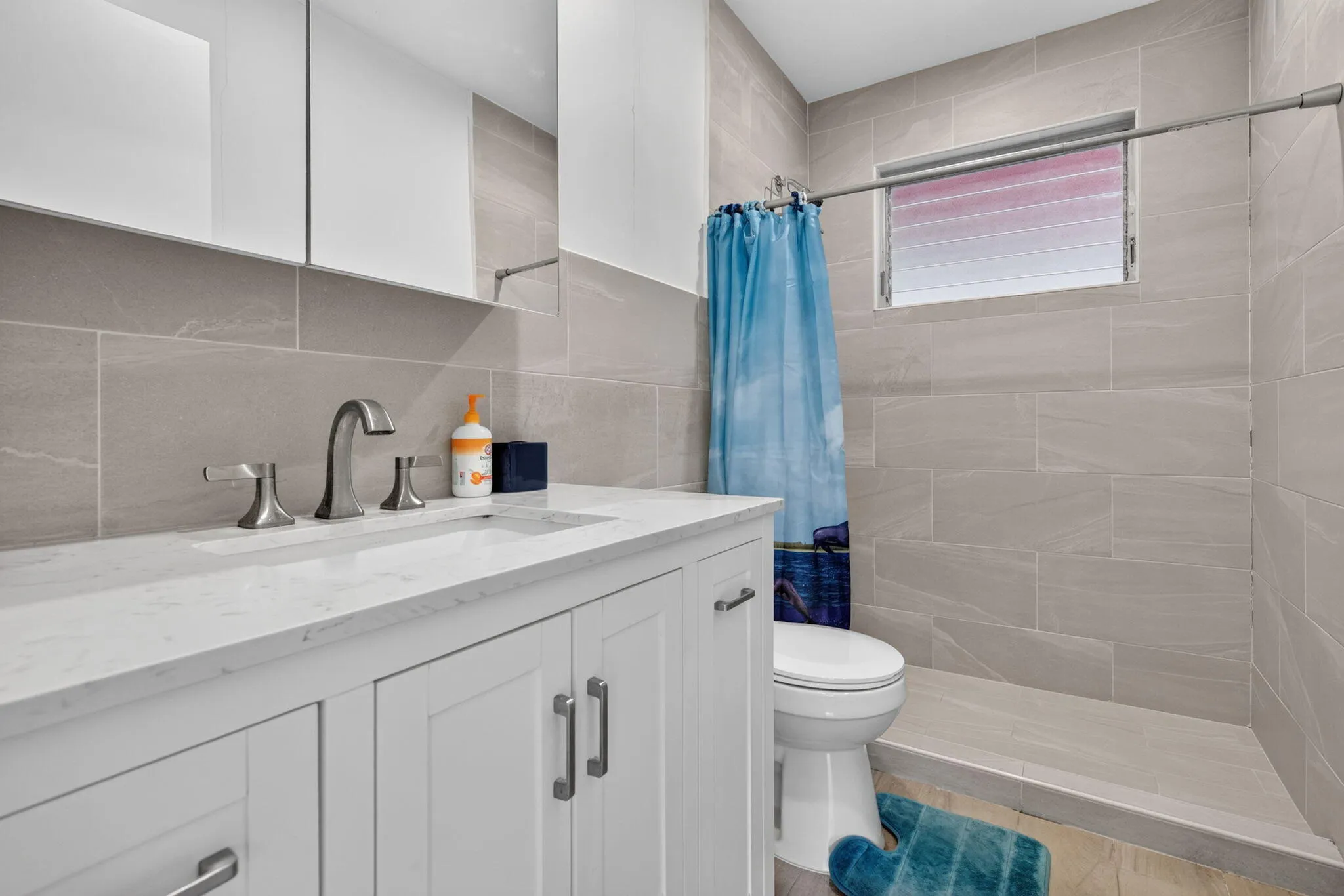 Renovated Full Bathroom — Walk-In Tiled Shower and Quartz-Look Vanity