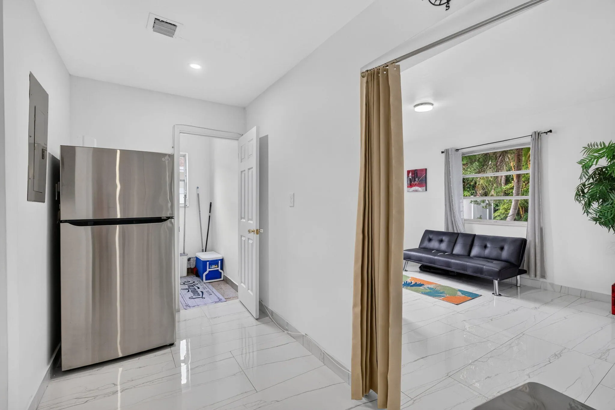 Interior Hall with Second Full-Size Refrigerator — Built for Short-Term Rental Turnovers
