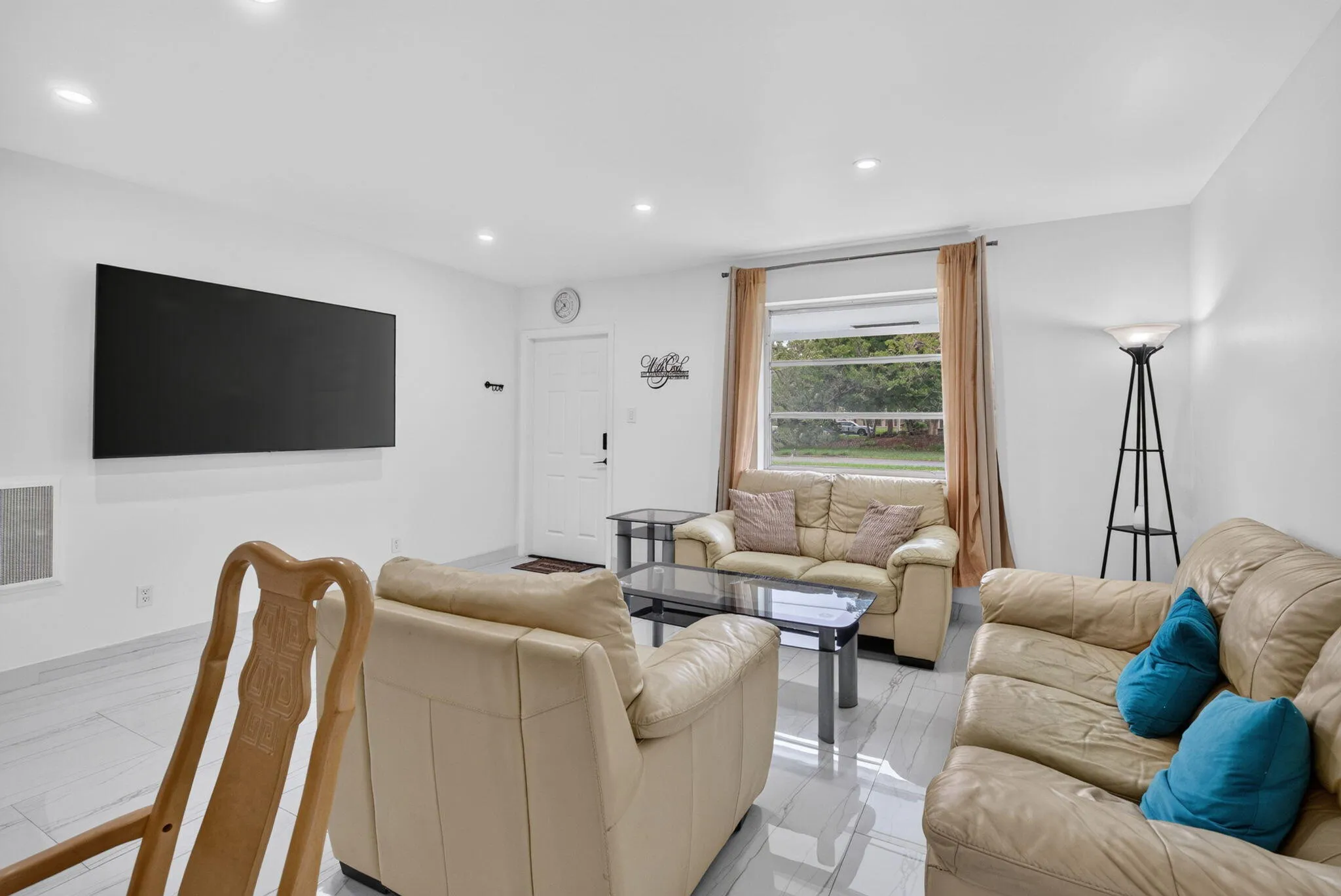 Second Living Area with TV Wall — Ideal for Multi-Generational or Group Occupancy