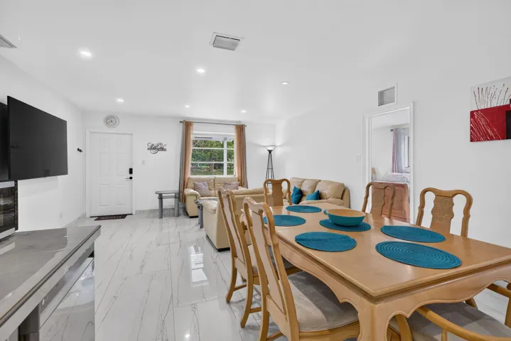 Formal Dining Area Open to Living Room — Seats Six for Group Stays