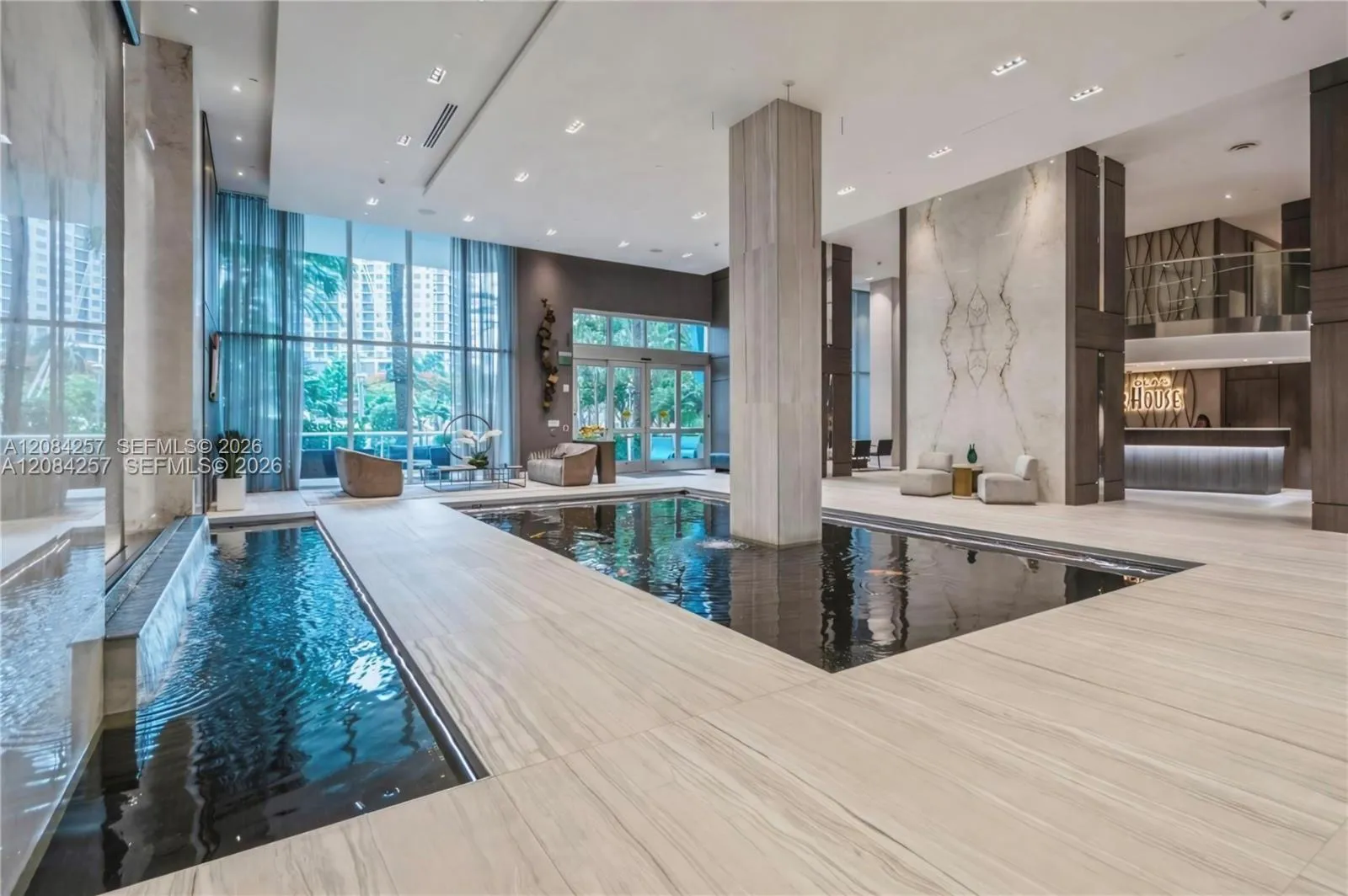 LOBBY ENTRANCE WITH KOI POND/WATERFALL