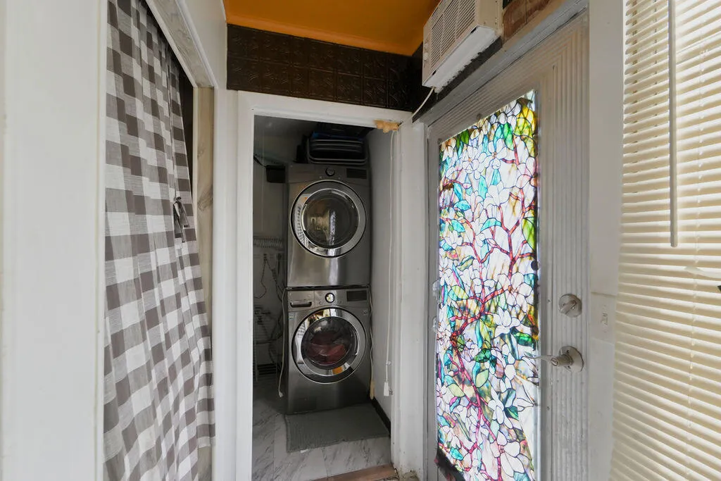 Laundry/Utlity Closet with extra storage, full sized W&D and laundry tub