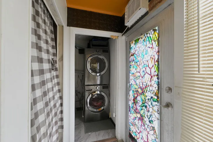 Laundry/Utlity Closet with extra storage, full sized W&D and laundry tub