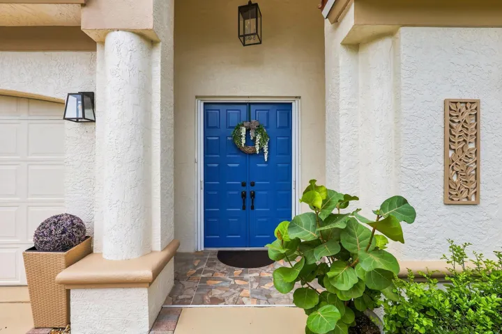 Front door entrance leads to courtyard patio