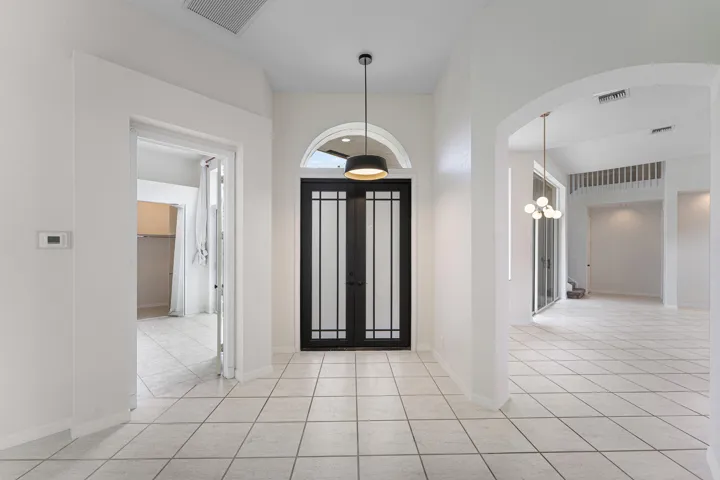 Etched Glass Double Doors To Entry Foyer