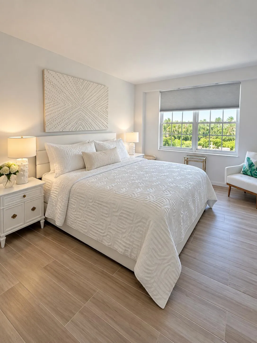 Spacious bedroom featuring wood-finish tile flooring, a large window, and recessed lighting