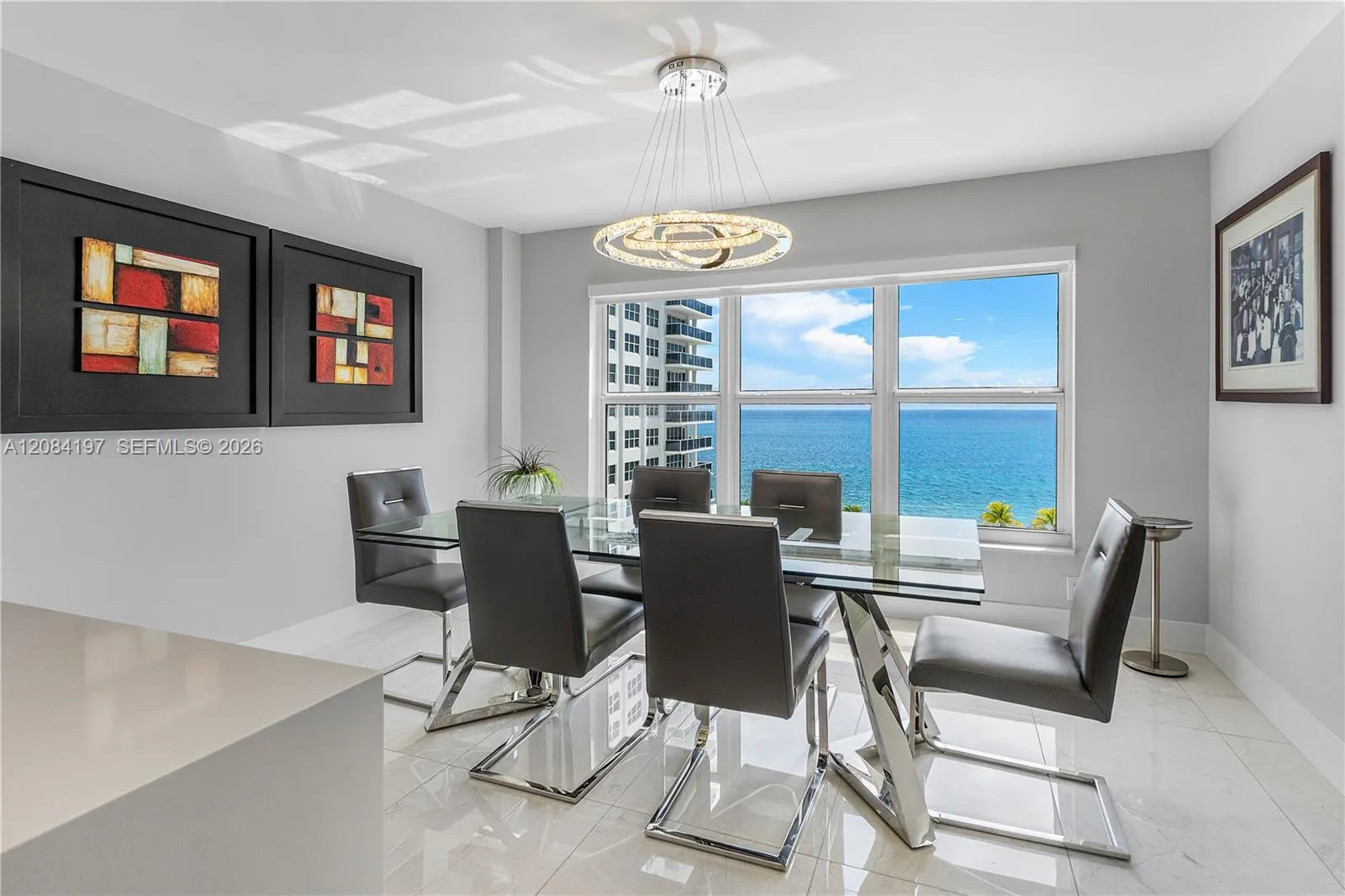 Very Spacious (table stretches to 130") with crystal lights and electric solar shades