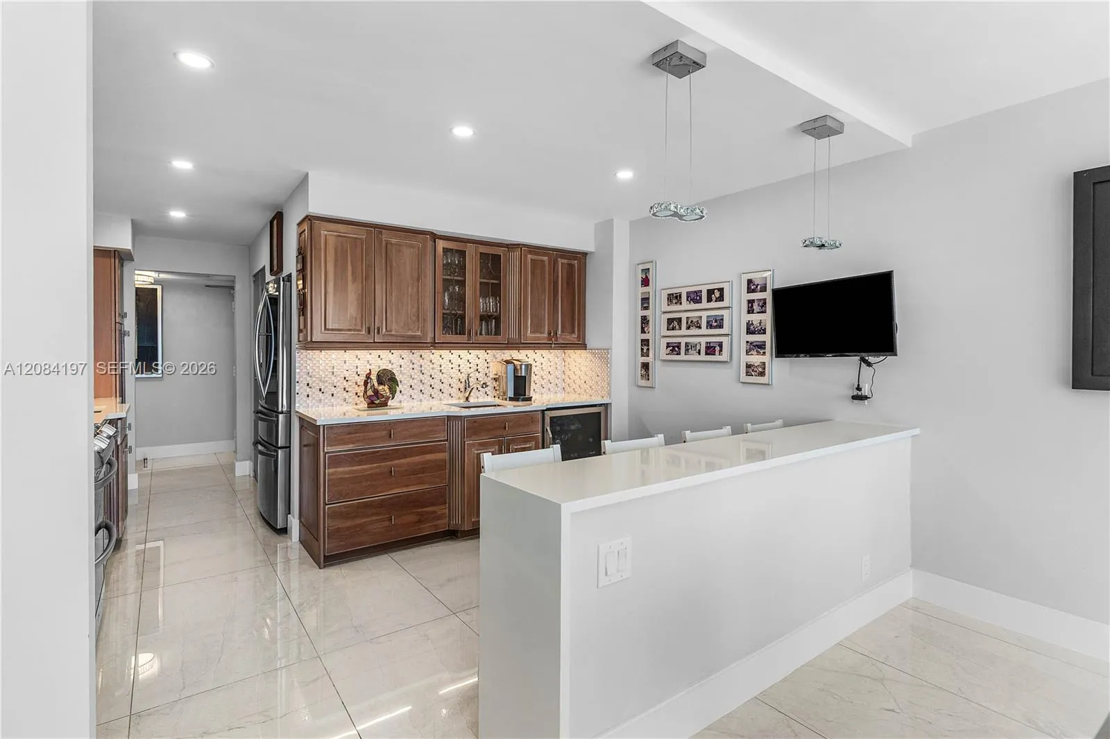 Beverage Center with wine refrigerator and sink