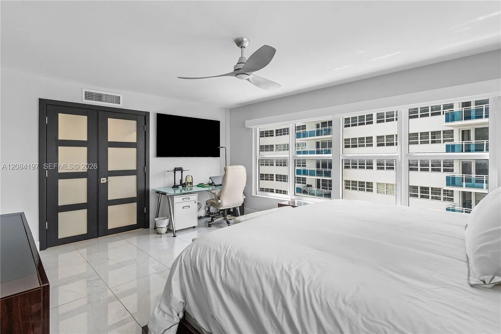 Oversized Primary Bedroom with Electric Blackout Shades and Solar Shades