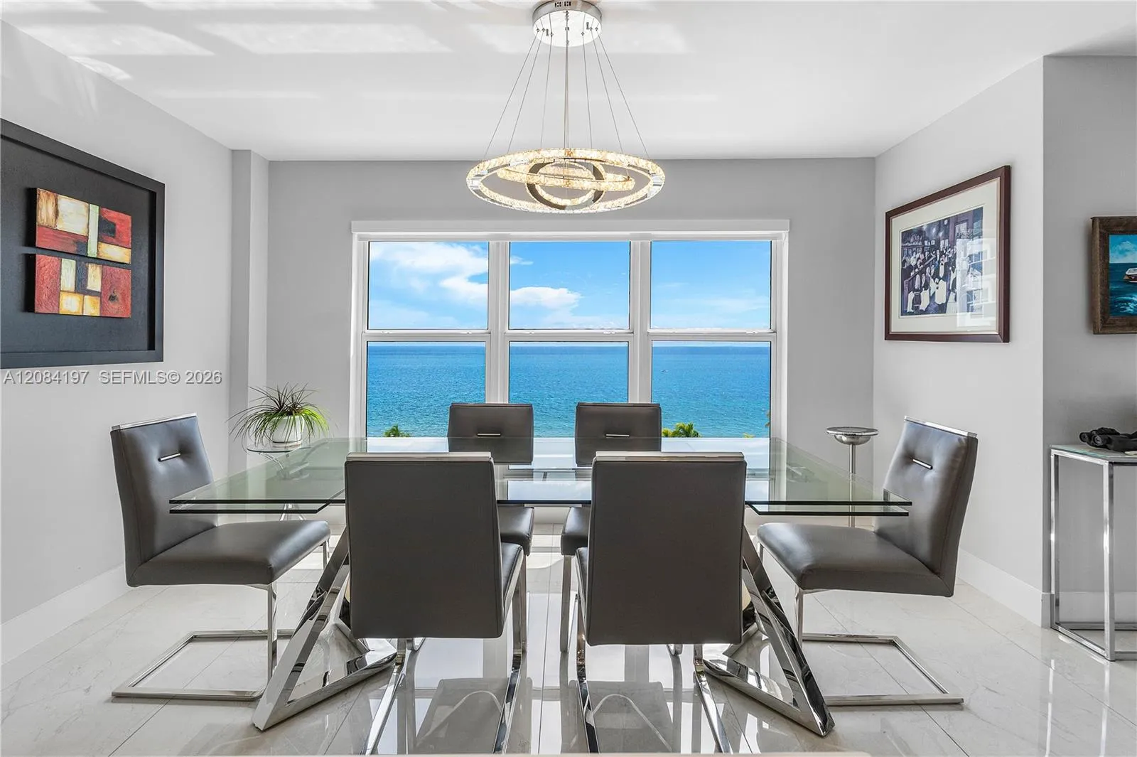 Very Spacious (table stretches to 130") with crystal lights and electric solar shades