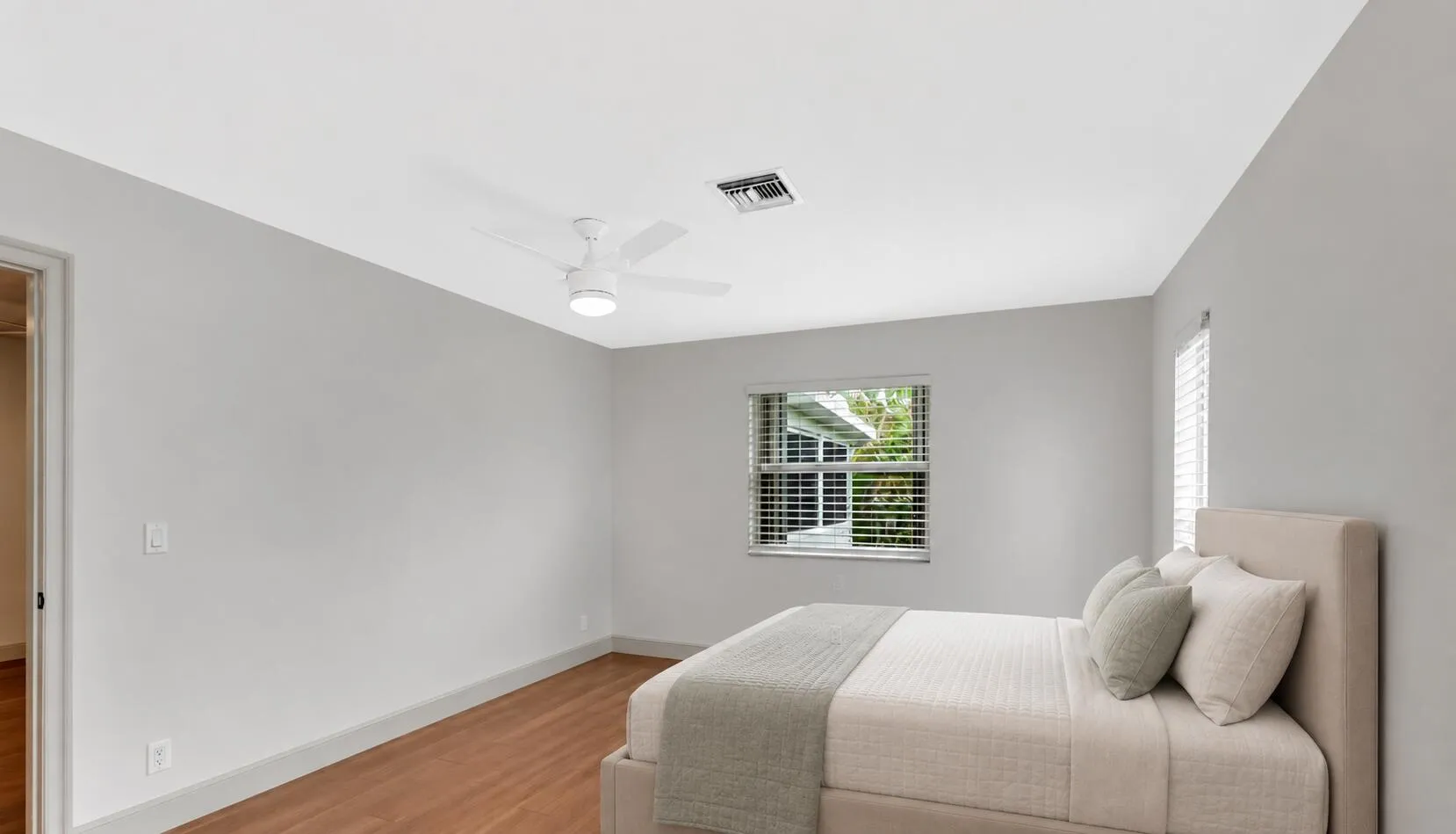 Photo has been virtually staged with AI-generated furnishings for illustrative purposes. Landlord will furnish the unit upon execution of a lease.