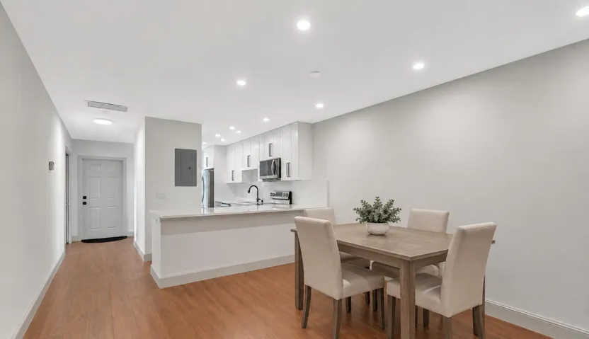 Photo has been virtually staged with AI-generated furnishings for illustrative purposes. Landlord will furnish the unit upon execution of a lease.