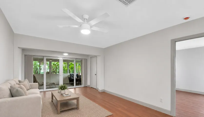 Photo has been virtually staged with AI-generated furnishings for illustrative purposes. Landlord will furnish the unit upon execution of a lease.