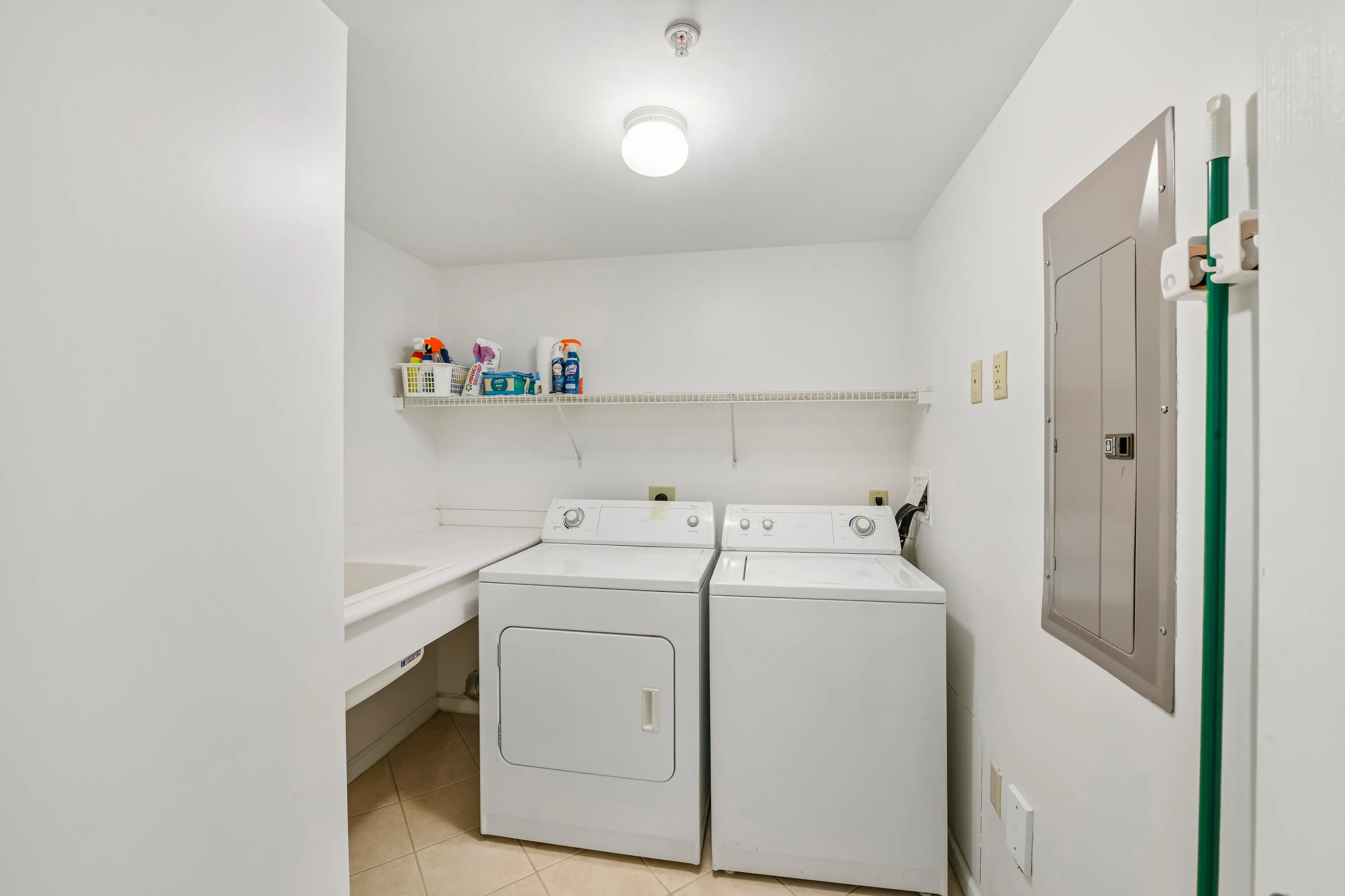 In-unit washer and dryer with sink