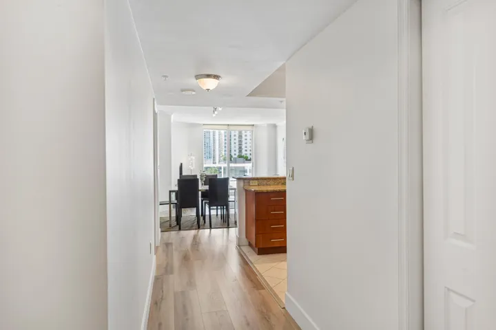 Large foyer entrance with laundry room to the left and large closet to the right.